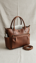 Solaine Mocha Tote in leather, front view on neutral background