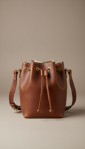 Solaine Boheme Bucket Bag in leather, front view on neutral background