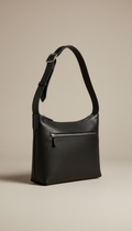 Solaine Midnight Shoulder Bag in leather, front view on neutral background